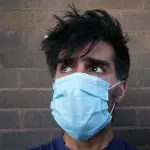 Covid-19, è vero che la mascherina dimezza il contagio?